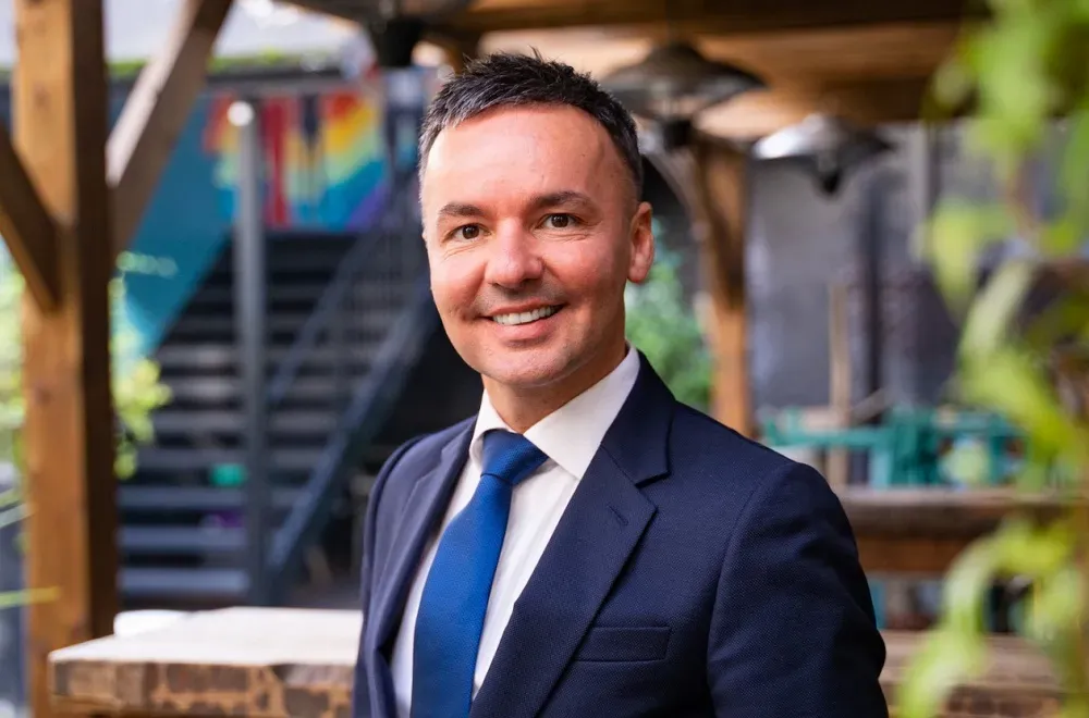 How much does Birmingham Pride's director owe the public?